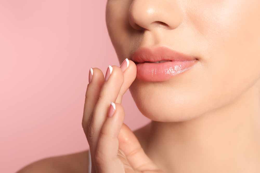 Young woman with beautiful lips