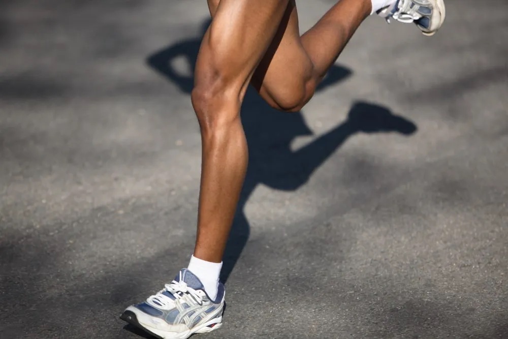 A person running showing off their calves